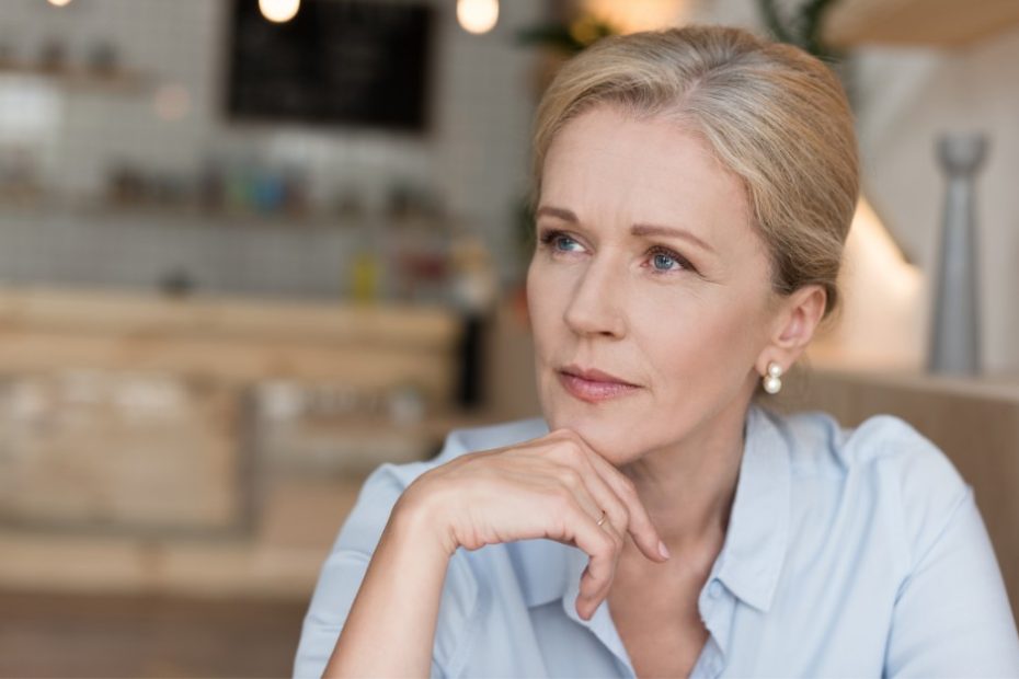 Woman thinking about the importance of Superannuation and Wills, realizing these are essential Components of Australian Estate Planning