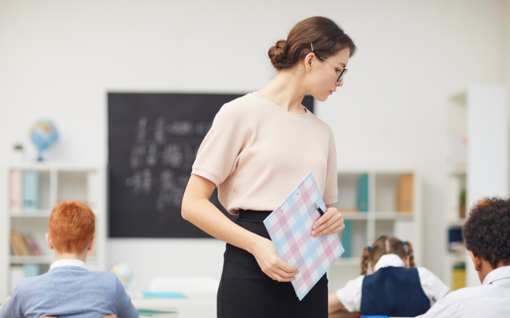 female teacher aware of Workers' Compensation for Teachers