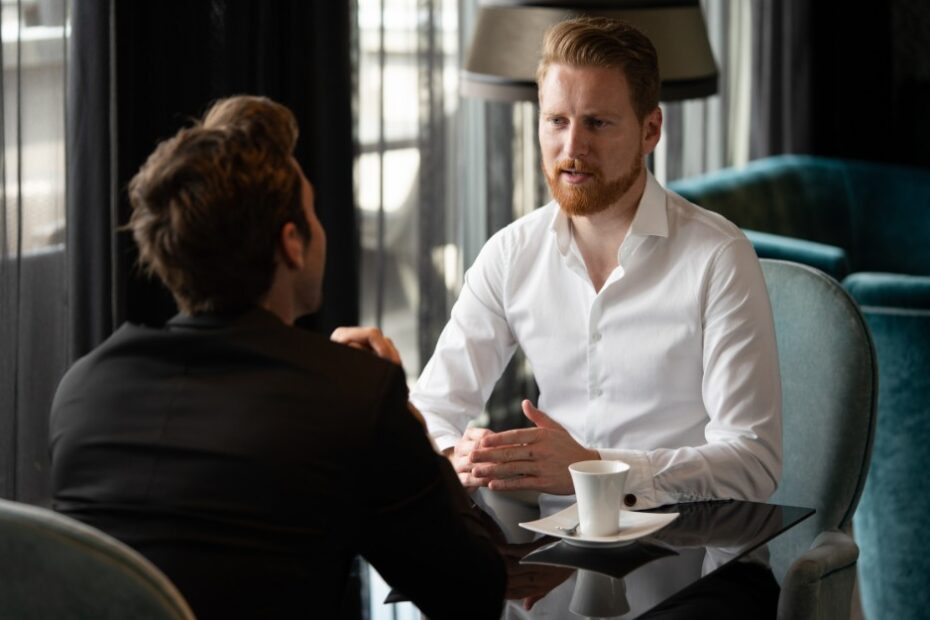 Man talking to a lawyer about how to challenge a Will due to a lack of testamentary capacity