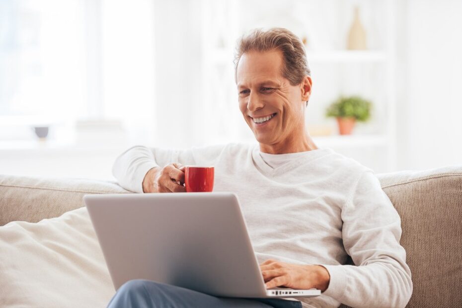 Man smiling while estate planning for digital assets