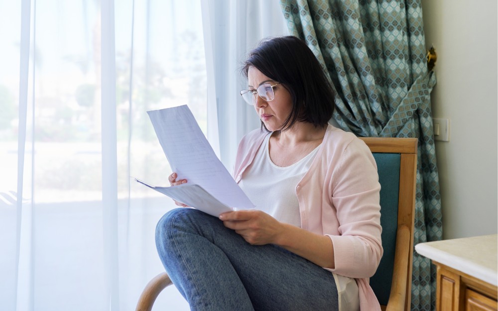 Woman examining an informal Will